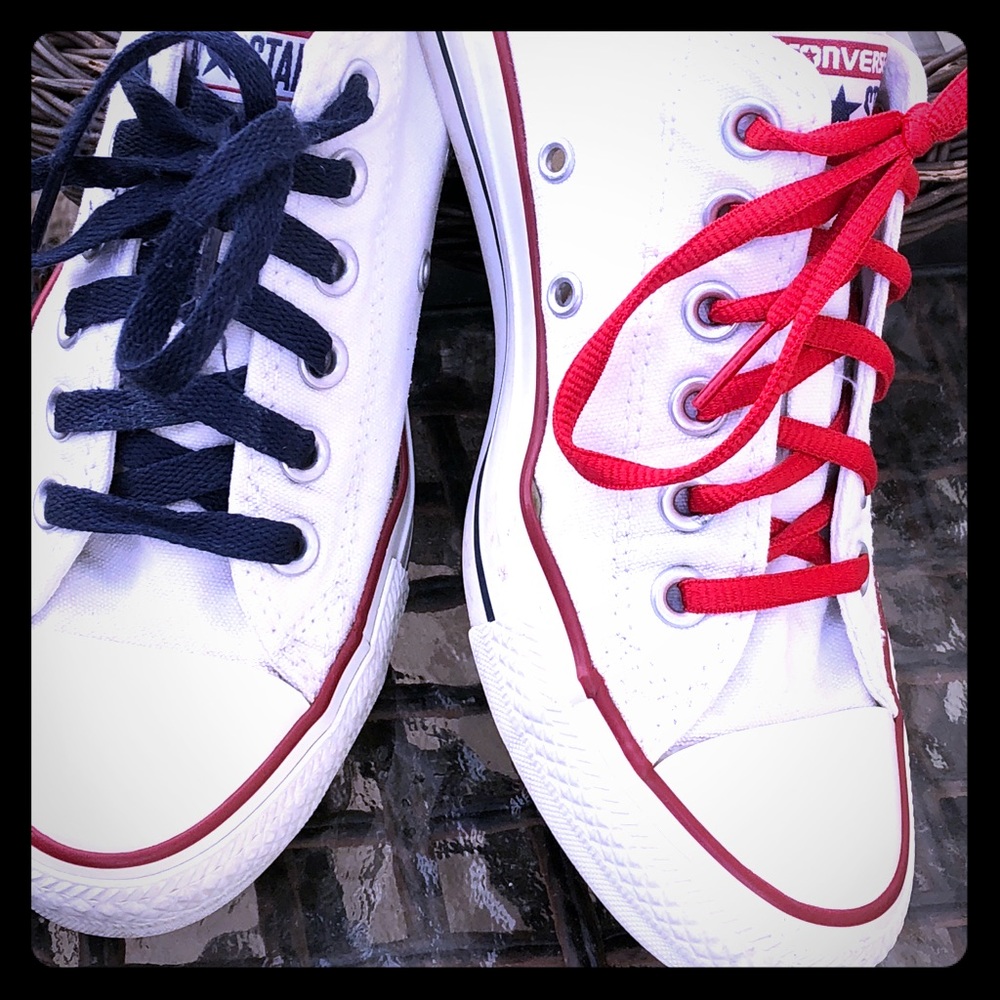White Chuck Taylor tennis shoes. Good condition.